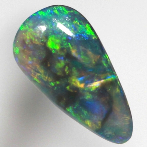 SOLID BLACK OPAL Bright colour partches of orange and green